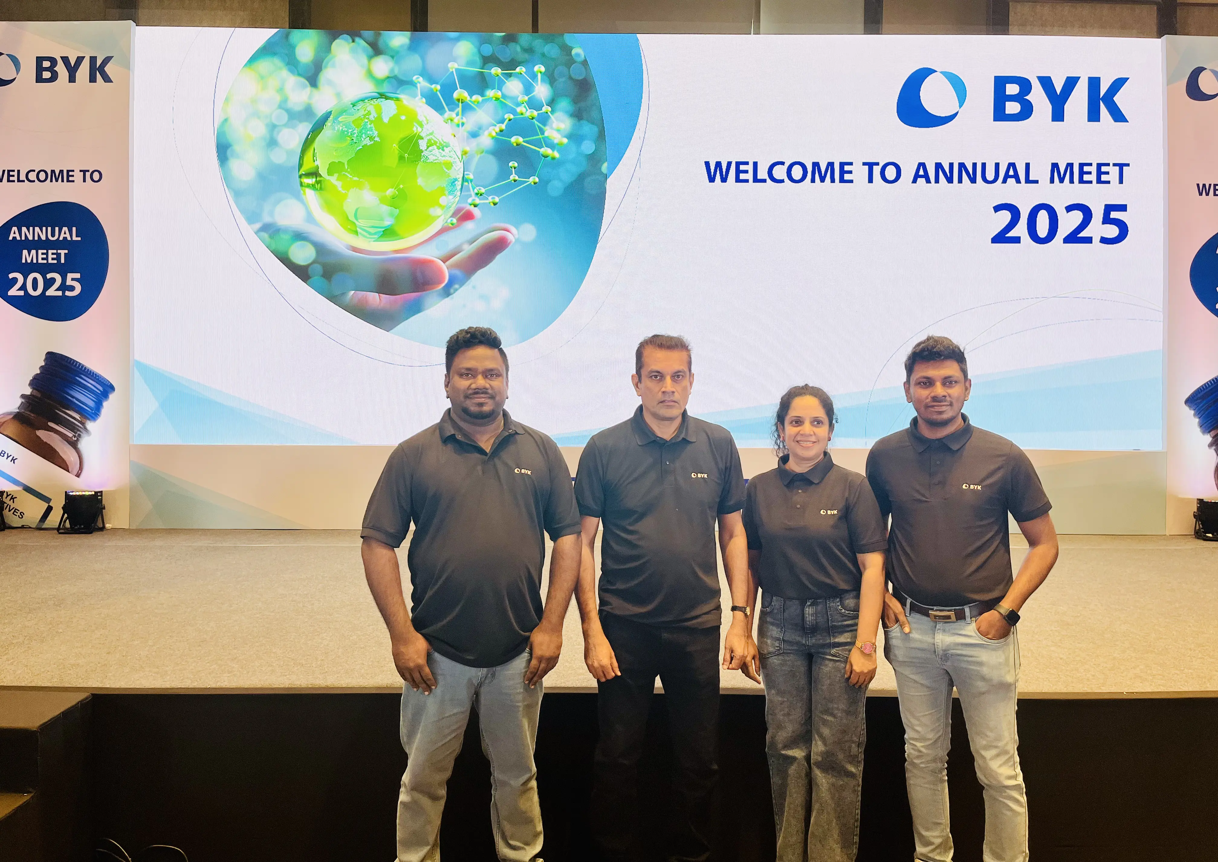 Four Chemanex PLC employees at a group photograph at BYK annual meet